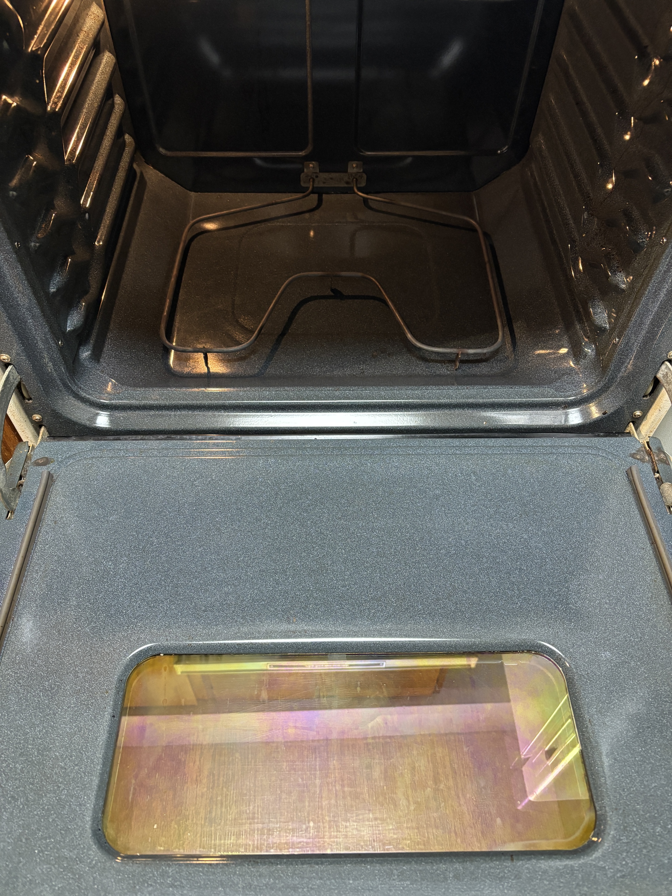 Deep cleaning results in Broken Arrow Oklahoma - spotless oven after professional cleaning by Vital Cleaning Services